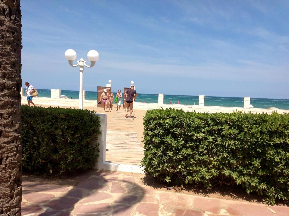 Urbanizacion Primera Linea De Playa Denia Bagian luar foto